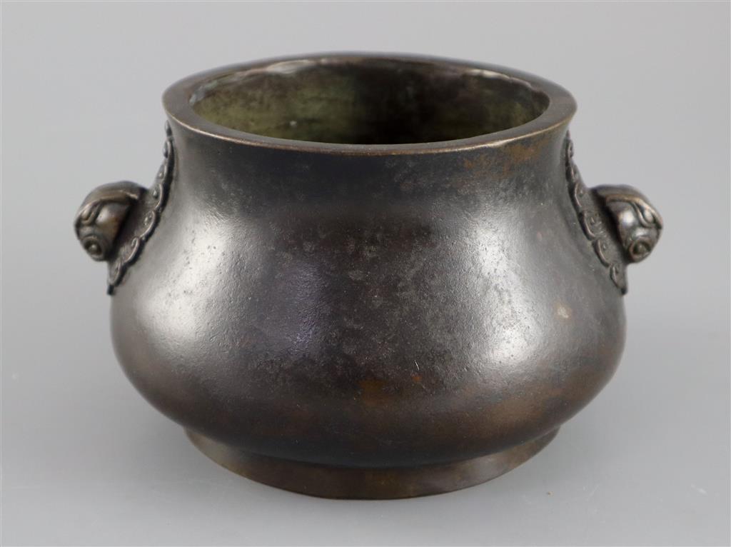 A Chinese bronze baluster censer, Xuande four character mark, but later, 16cm wide